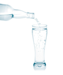 Pour into a glass isolated on a white background.