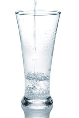 water splashing from glass isolated on white background