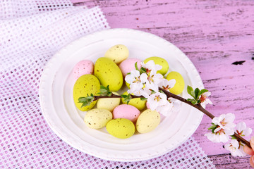 Composition with Easter eggs and blooming branches