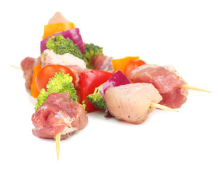Raw pork kebab isolated on white
