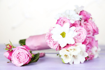 Beautiful wedding bouquet and boutonniere