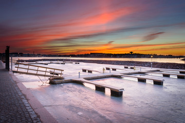 frozen dock on sunset - obrazy, fototapety, plakaty