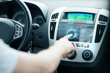 man using car control panel
