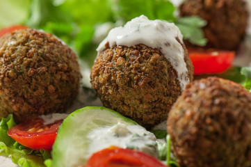 Falafel on salad leaves