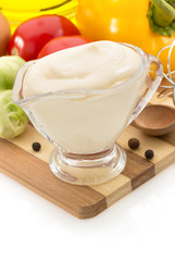 mayonnaise sauce in bowl on white