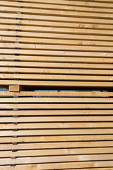 Stack of new wooden studs at the lumber yard