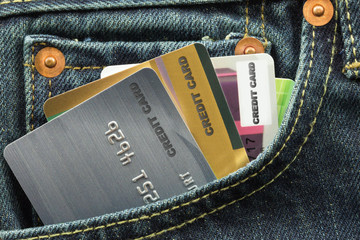 credit cards in blue jeans pocket