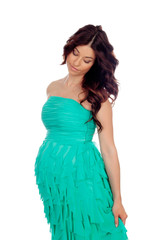 Beautiful pregnant woman with green dress