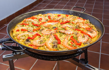 Traditional spanish paella cooked in a pan