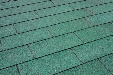 Green asphalt shingle