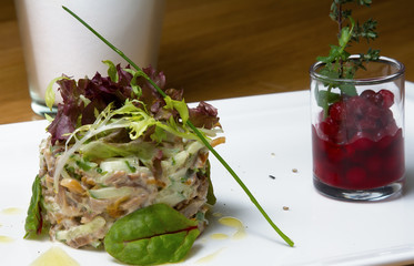 Fish tartare with cranberry sauce