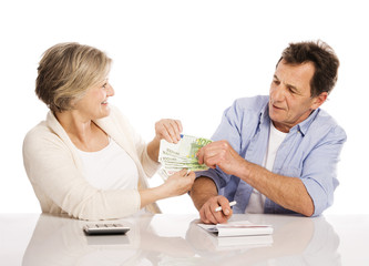 Senior couple with money