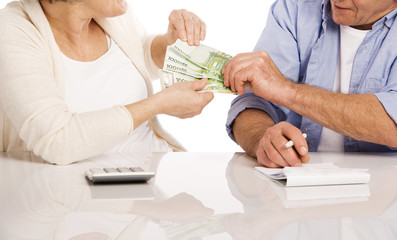 Senior couple with money