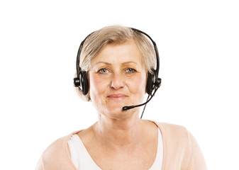Senior woman with headset