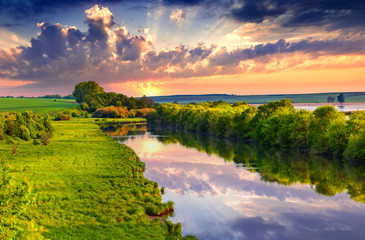 Naklejka premium Colorful summer morning on the river
