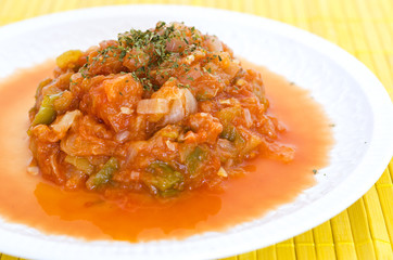 Spanish pisto food with onions, pepper, zucchini and tomatoe
