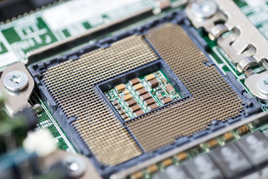Closeup of Computer Processing Unit on Mainboard Circuit