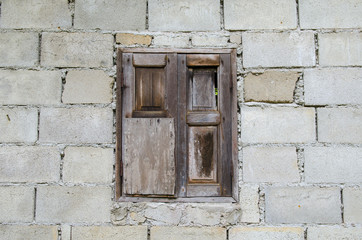 background of old brick wall with vintage window