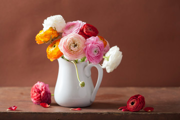 beautiful ranunculus bouquet in vase © Olga Miltsova