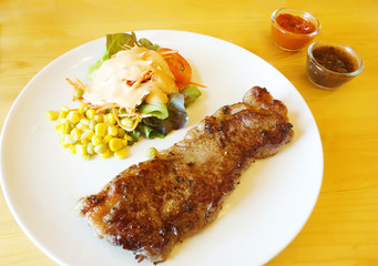 Grilled beef steak with salad