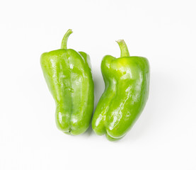 Green pepper on white background