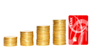 columns of gold coins and golden credit card isolated on white b