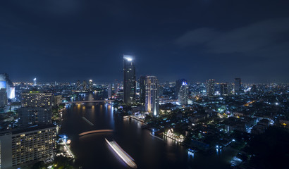 Fototapeta premium Panorama view of Bangkok city scape at nighttime