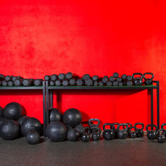 Kettlebell  dumbbell and weighted balls at gym