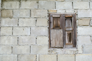 background of old brick wall with vintage window