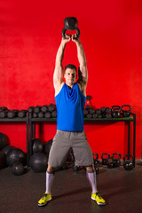 Kettlebell workout training man at gym