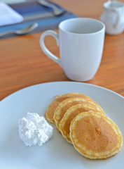 Pancakes on white dish