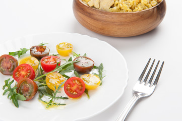 Cherry tomatoes and arugula salad