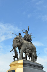 Fototapeta na wymiar The elephant statue in the blue sky,Monument of King Naresuan at Suphanburi province in Thailand