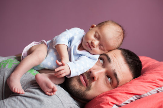 Newborn Baby Sleeping With Father