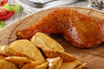chicken leg with baked potatoes
