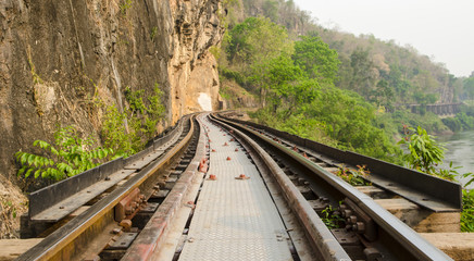 Fototapeta na wymiar Railroad tracks in rural areas, with the natural site, Thailand