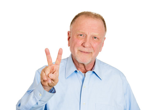 Senior happy man showing two or peace sign hand gesture 