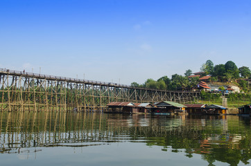 Fototapeta na wymiar The wooden bridge is the second longest in the world. at Sangklaburi in Kanchanaburi, Thailand