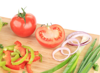 Fresh vegetables on cutting board.