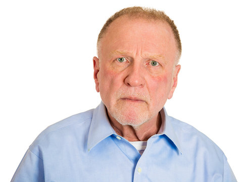 Headshot angry older man grumpy isolated on white background 
