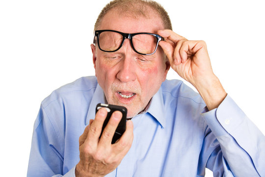 Blind old man. Headshot aging guy has difficulty reading  text