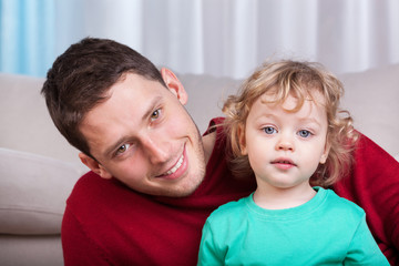 Cheerful father and son