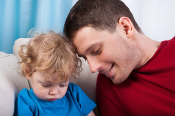 Dad and son spending time together