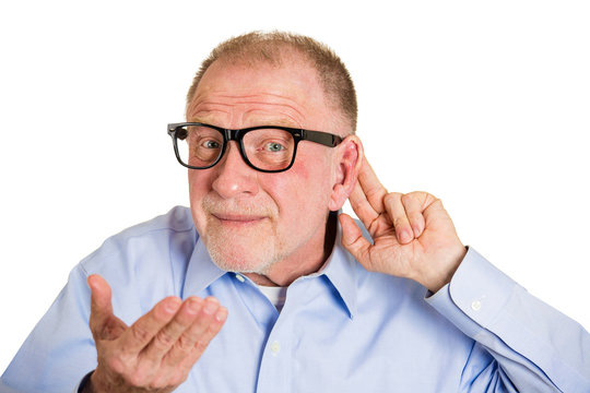 What did you say? Portrait senior man with hearing difficulties