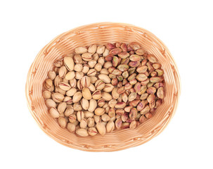 Wicker basket with pistachios.