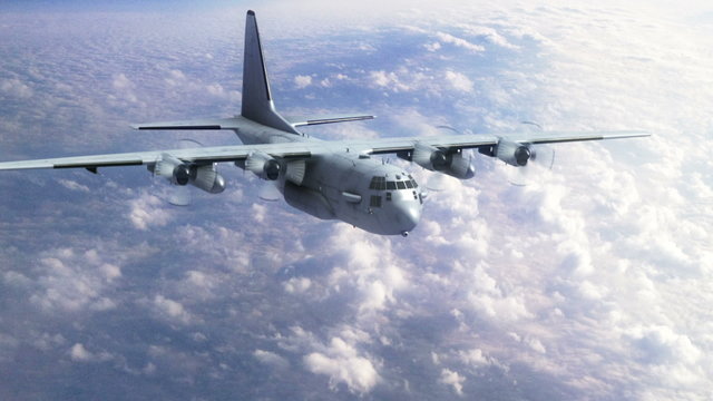 Ac 130 Gunship flying into view from high above the clouds