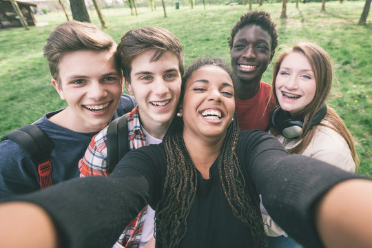 Group of Multiethnic Teenagers Taking a Selfie