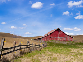Red barn and blue sky. © Gregory Johnston