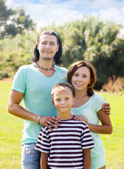 Fototapeta na wymiar Portrait of parents with teenager son