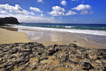 Lanzarote Playa del Pozo beach in costa Papagayo Canary Islands